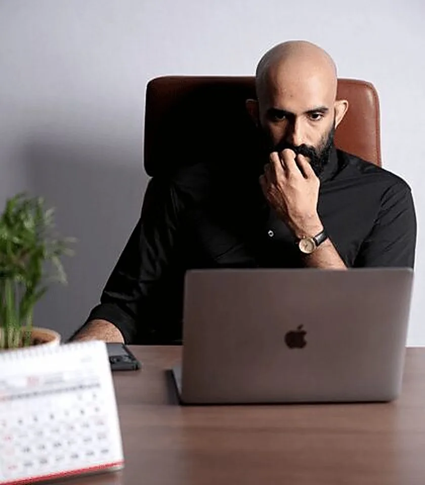 Josbin Itty at his desk in Kochi